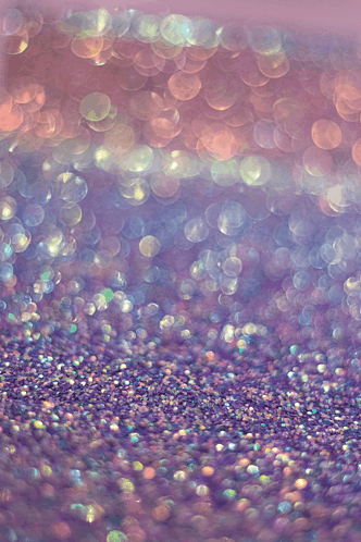 a purple and blue background with a lot of glitter