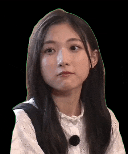 a girl with long black hair is wearing a white shirt