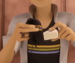 a cartoon character is holding a cell phone and a piece of paper in his hands .