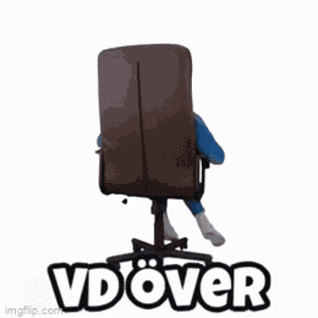 a man is sitting in an office chair with his legs crossed and the words vd over behind him .