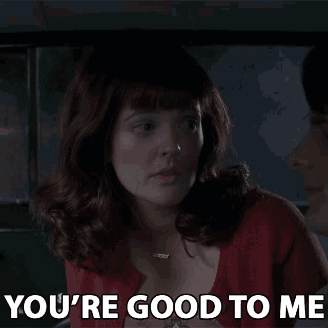 a woman says you 're good to me next to a man in a car