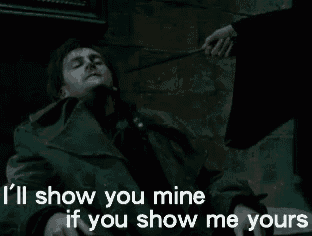 a man is laying on the ground with the words " i 'll show you mine if you show me yours " on the bottom