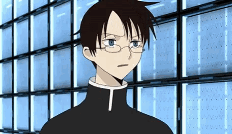 a cartoon character with glasses and a t on his chest