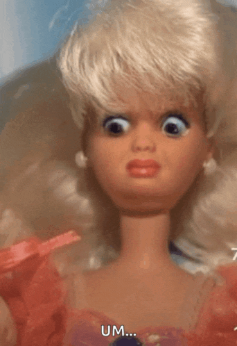 a close up of a barbie doll making a funny face with the words um written below it