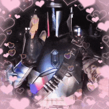 a man in armor is surrounded by pink hearts and says i love you