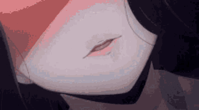 a close up of a person 's mouth with a slight tear in it .