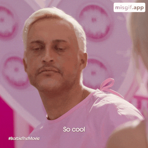 a man in a pink shirt says so cool in front of a pink background