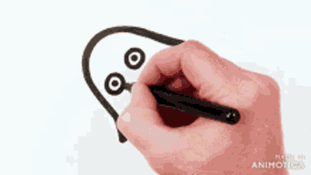 a person is drawing a ghost with a marker and the words made in animatica are visible in the corner