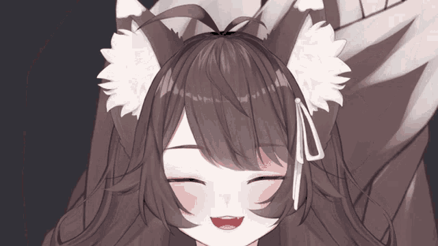 a close up of a girl with a fox ear smiling