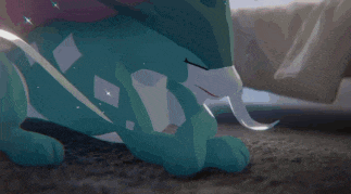 a blue and white cat is laying on the floor next to a person .