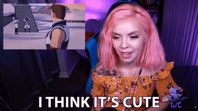 a woman with pink hair says " i think it 's cute " in front of a cartoon