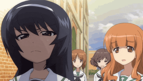 a group of anime girls standing next to each other