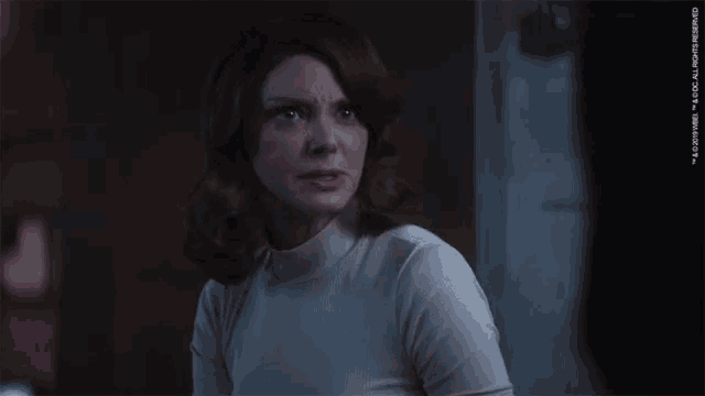 a woman says " you 're ruining this moment for me " in a dark room
