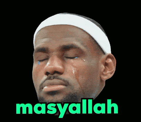 a man with a white headband is crying and the word masyallah is written above him