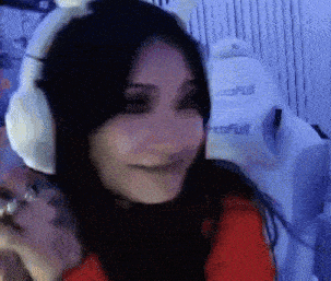 a woman wearing white headphones with the word full on the back