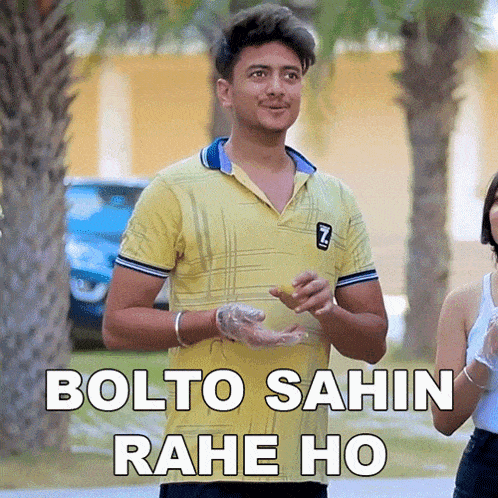 a man in a yellow shirt is standing next to a woman with the words bolto sahin rahe ho on the bottom