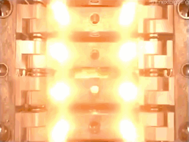 a close up of a machine with the words " the next lighting " on the bottom right