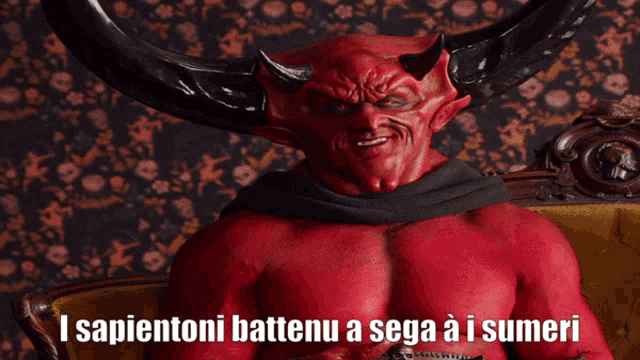 a devil with horns is sitting on a couch with the words i sapientoni battenu a sega ai sumeri