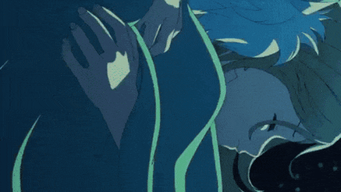 a close up of a person 's face in a dark blue background