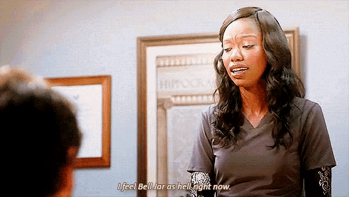 a woman in a scrub top says " i feel belluar as hell right now "
