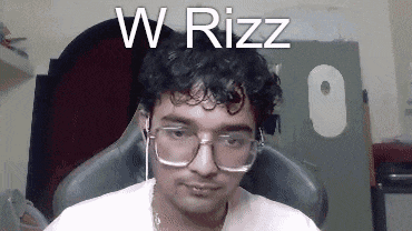 a man wearing glasses and ear buds is sitting in a chair in front of a computer mouse .