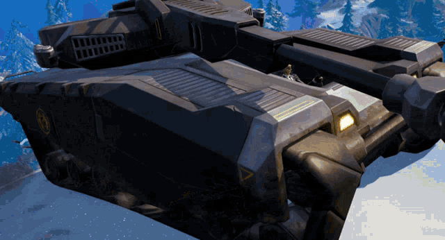 a large futuristic vehicle with a triangle on the side