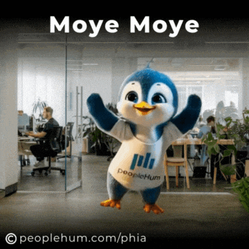 a penguin mascot is wearing a shirt that says peoplehum on it