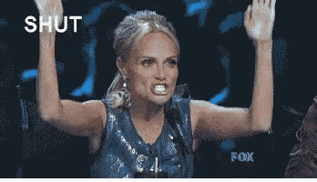 a woman with her hands in the air with the words shut the front above her