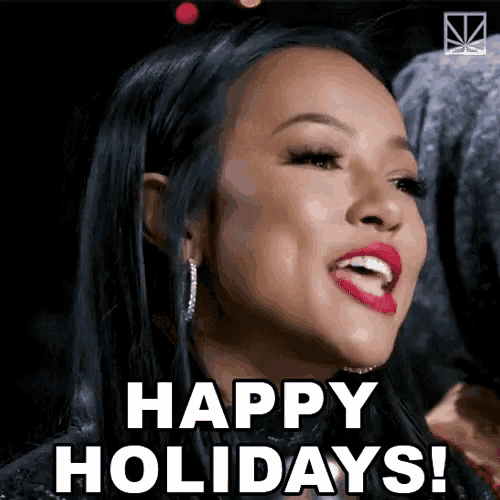 a woman is saying happy holidays with her mouth open
