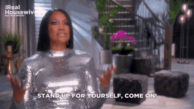 a woman says " stand up for yourself come on "
