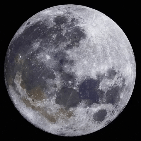 a full moon against a black background with a few small stars