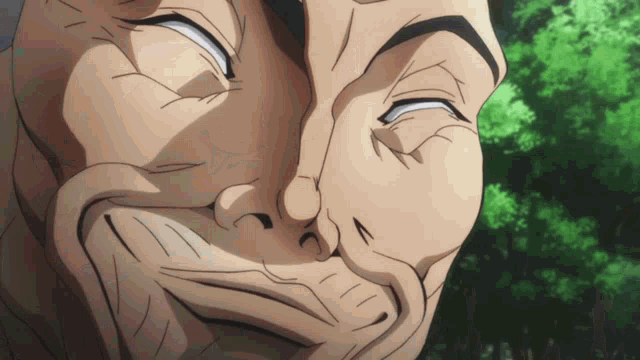 a close up of a man making a funny face