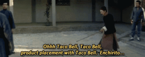 a man is holding a sword and says ohh taco bell taco bell product placement with taco bell