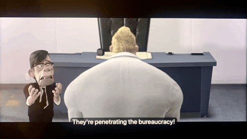 a cartoon of a man sitting at a desk with the words they 're penetrating the bureaucracy at the bottom