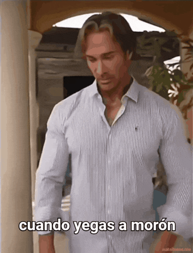 a man in a striped shirt says cuando yegas a morón
