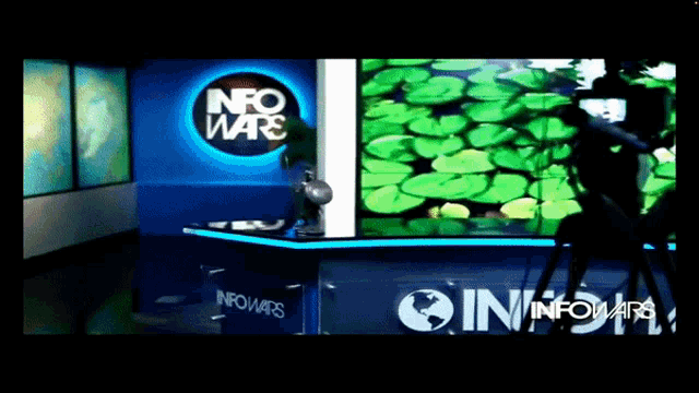 a newsroom with a sign that says nfo wars