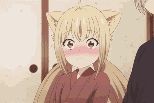 a girl with cat ears and a surprised expression on her face