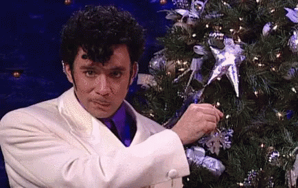 Hanging Ornaments GIF - Prince Christmastree Fred Amisen GIFs