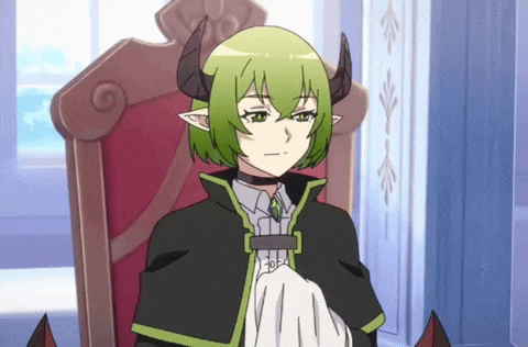 a cartoon character with green hair and horns sitting in a chair
