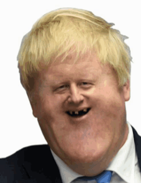 a close up of a man 's face with a big smile on his face