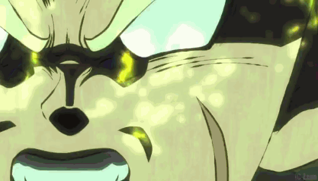 a close up of a man 's face with a glowing eye