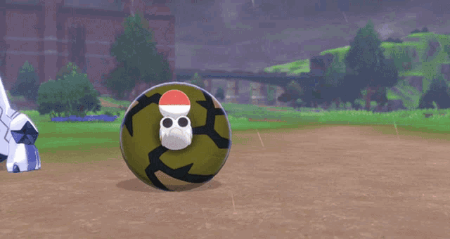 a soccer ball with a red white and black skull on it