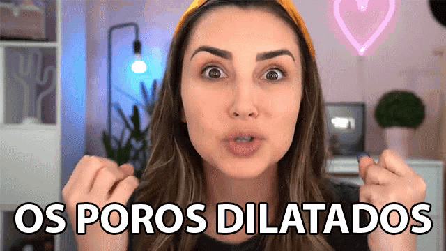 a woman is making a funny face and the words os poros dilatados are visible