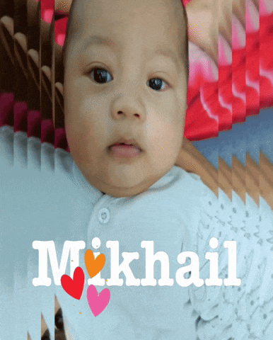 a picture of a baby with the name mikhail on the bottom