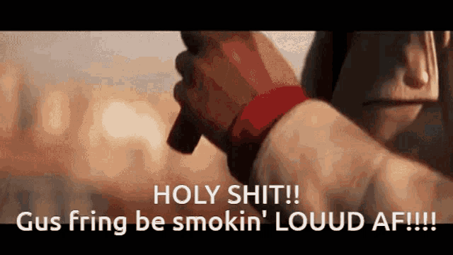 a man holding a gun with the words holy shit gus fring be smokin ' louud af !!!