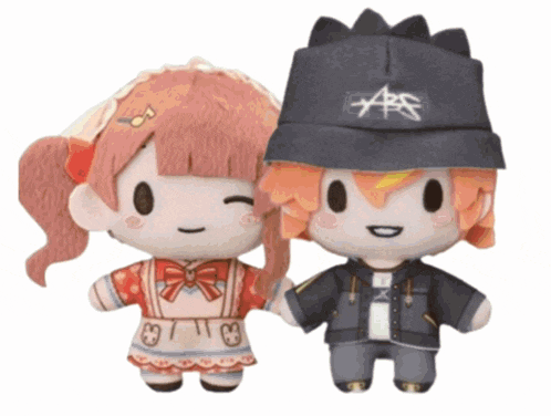 a boy and a girl are holding hands and the boy is wearing a hat that says aps