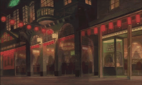 a store front with a green sign that says ' a ' on it