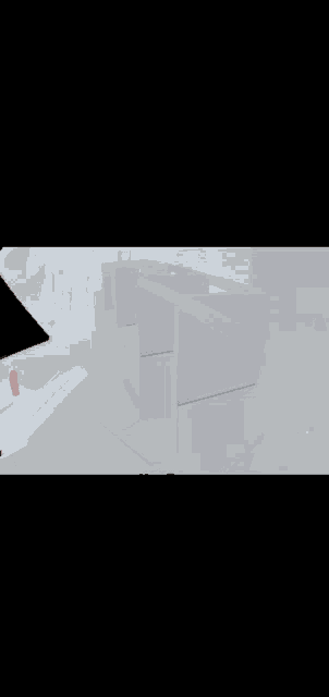 a white room with a red arrow pointing to a staircase