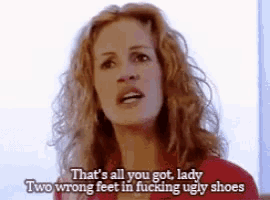 a woman is saying that 's all you got lady two wrong feet in fucking ugly shoes .