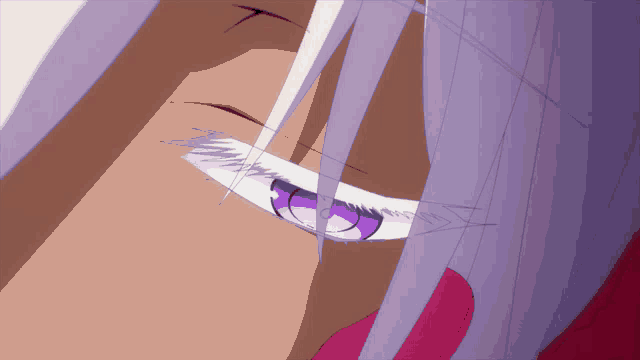 a close up of a person 's eye with purple irises